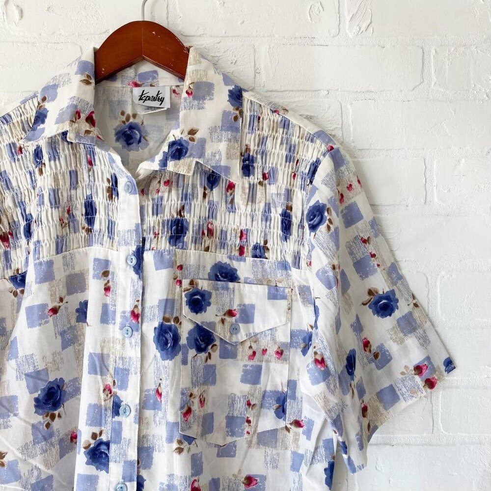 Vintage floral button up about an XL cream and blue 50% polyester 50% cotton